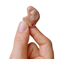 In the Ear Hearing Aid in Hand ITE